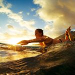 female surfer in Hawaii